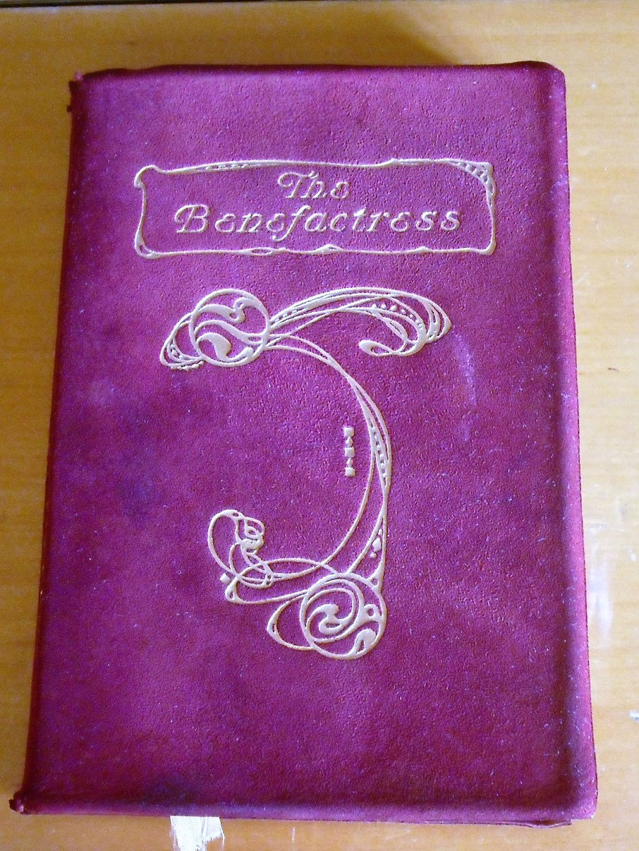 The Benefactress front cover showing gilded title & decoration
