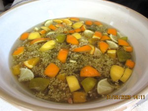 Elderflowers & citrus fruit steeping in syrup.